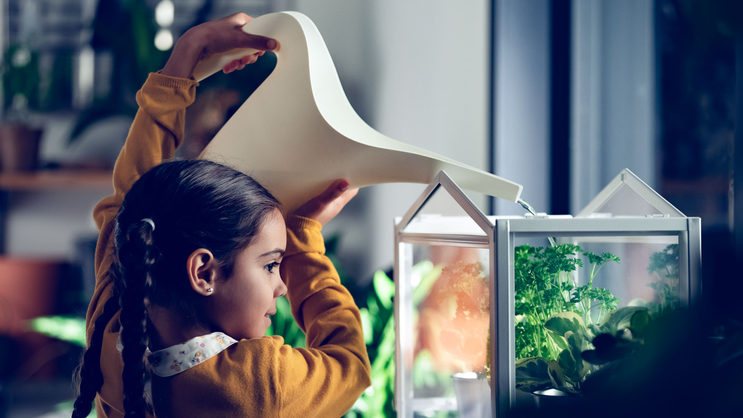 Girl watering her garden for Ikea