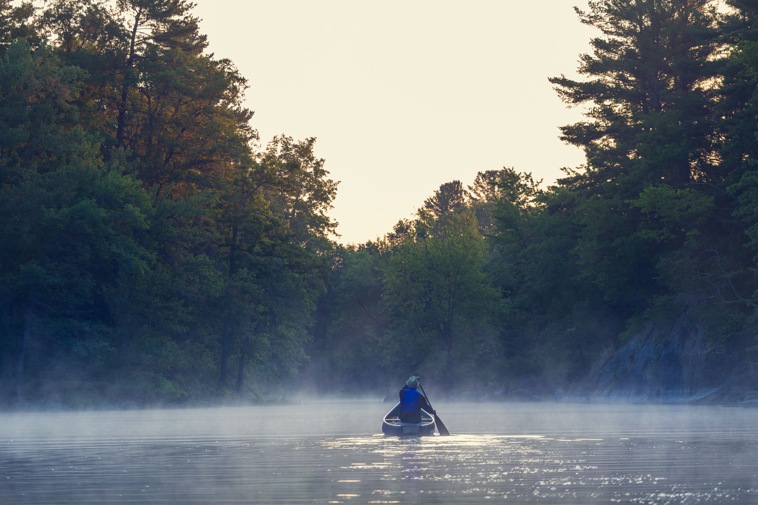 man canoeing