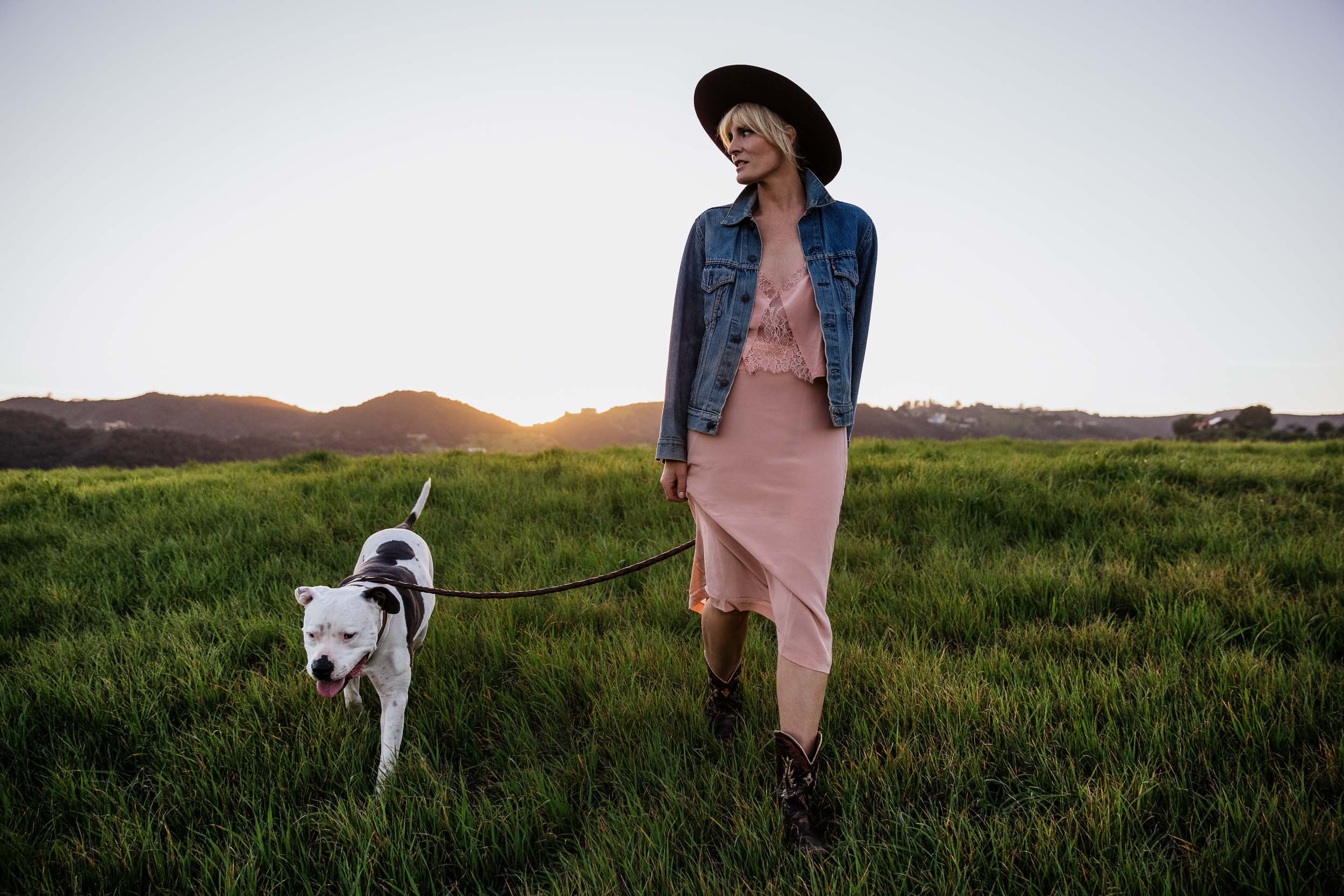 Marnie Herald walking her dog in a field